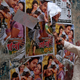 A Bangladeshi movie theatre worker removes posters of a film Rana Plaza in Dhaka, Bangladesh, Tuesday, Aug. 25, 2015. Bangladesh's High Court has imposed a six-month ban on the screening of the movie about a garment worker who was rescued from the rubble 17 days after a five-story factory complex collapsed more than two years ago, killing more than 1,000 people.